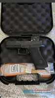Glock 9mm MOS pistol with Aimpoint COA