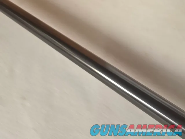 9431  Browning SA22 , 22 short, wheel sight, Belgium made, rare caliber, metal butt plate, one of the first made.