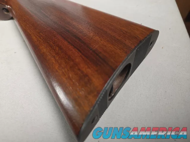 9431  Browning SA22 , 22 short, wheel sight, Belgium made, rare caliber, metal butt plate, one of the first made.