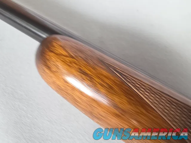 9431  Browning SA22 , 22 short, wheel sight, Belgium made, rare caliber, metal butt plate, one of the first made.