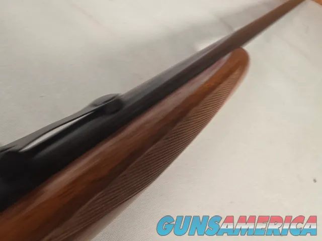 9431  Browning SA22 , 22 short, wheel sight, Belgium made, rare caliber, metal butt plate, one of the first made.