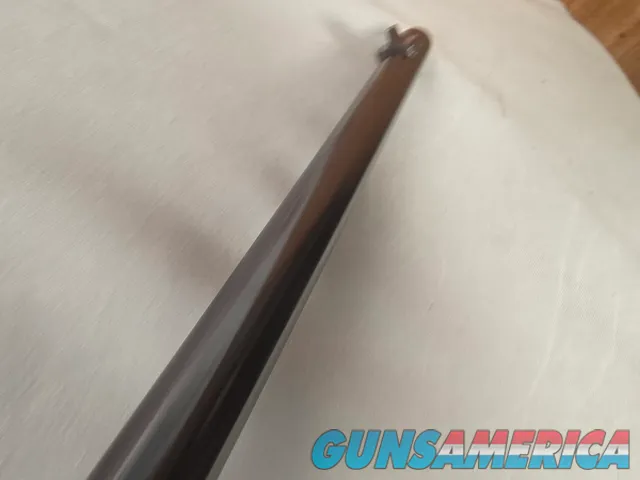 9431  Browning SA22 , 22 short, wheel sight, Belgium made, rare caliber, metal butt plate, one of the first made.