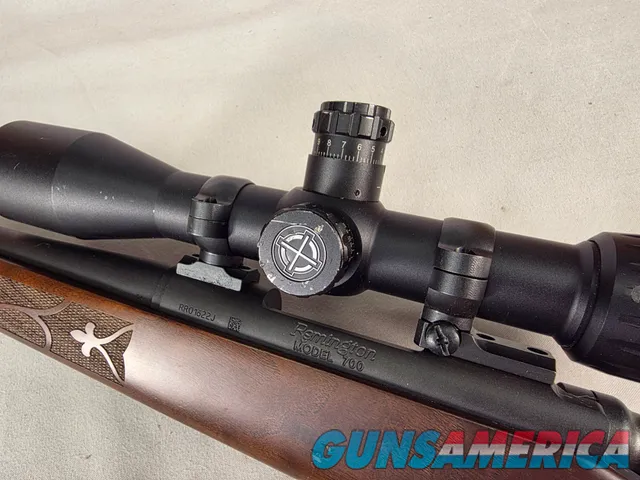 9484 Remington 700, 243 Caliber, 24” barrel, cheek piece, sling swivels, butt pad, DCR Sight man Scope, 3x12x44.