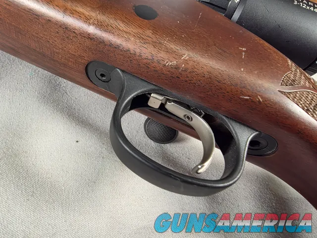 9484 Remington 700, 243 Caliber, 24” barrel, cheek piece, sling swivels, butt pad, DCR Sight man Scope, 3x12x44.