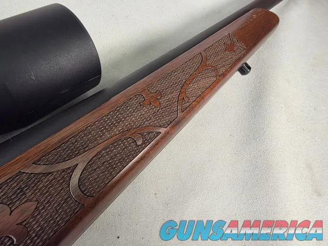 9484 Remington 700, 243 Caliber, 24” barrel, cheek piece, sling swivels, butt pad, DCR Sight man Scope, 3x12x44.