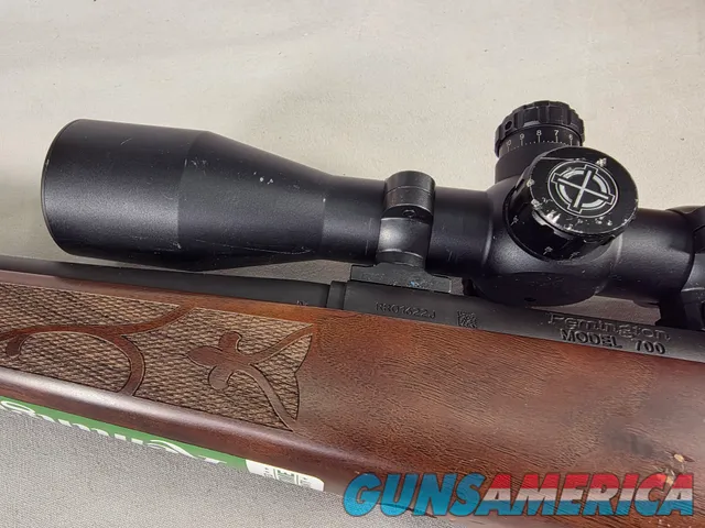 9484 Remington 700, 243 Caliber, 24” barrel, cheek piece, sling swivels, butt pad, DCR Sight man Scope, 3x12x44.