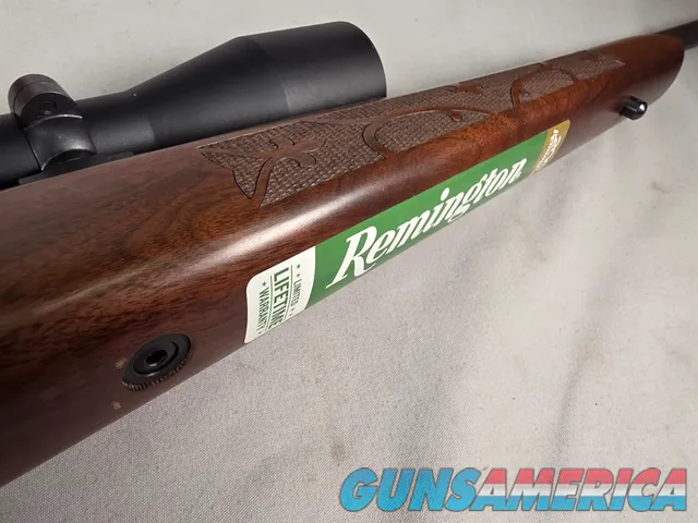 9484 Remington 700, 243 Caliber, 24” barrel, cheek piece, sling swivels, butt pad, DCR Sight man Scope, 3x12x44.