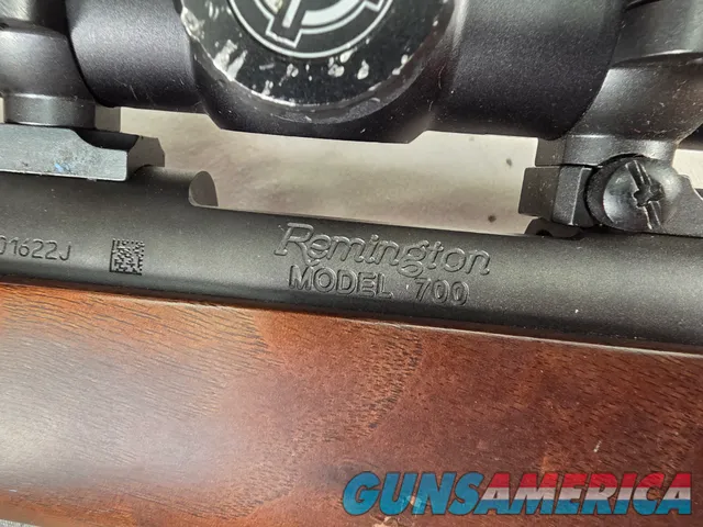 9484 Remington 700, 243 Caliber, 24” barrel, cheek piece, sling swivels, butt pad, DCR Sight man Scope, 3x12x44.