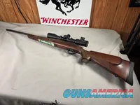 9484 Remington 700, 243 Caliber, 24” barrel, cheek piece, sling swivels, butt pad, DCR Sight man Scope, 3x12x44.