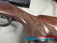 9484 Remington 700, 243 Caliber, 24” barrel, cheek piece, sling swivels, butt pad, DCR Sight man Scope, 3x12x44.