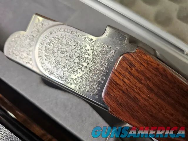 9041 SKB Model 785 O/U 3 Gauge skeet set, 410 Gauge 3”, 28 Gauge 2 ¾, 20 Gauge 3”, All are 28” Barrels, All have their own f