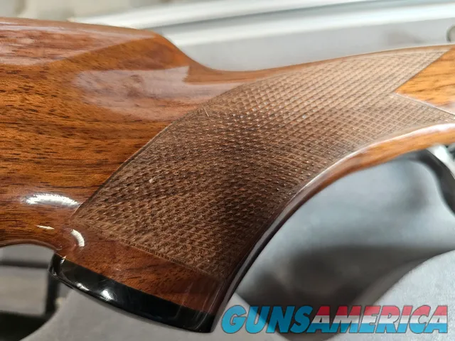 9041 SKB Model 785 O/U 3 Gauge skeet set, 410 Gauge 3”, 28 Gauge 2 ¾, 20 Gauge 3”, All are 28” Barrels, All have their own f