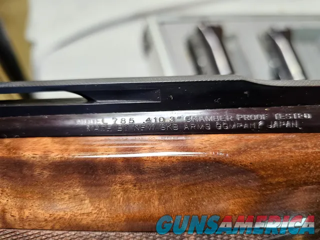 9041 SKB Model 785 O/U 3 Gauge skeet set, 410 Gauge 3”, 28 Gauge 2 ¾, 20 Gauge 3”, All are 28” Barrels, All have their own f