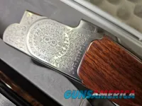 9041  SKB Model 785 O/U 3 Gauge skeet set, 410 Gauge 3”, 28 Gauge 2 ¾, 20 Gauge 3”, All are 28” Barrels, All have their own f