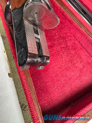 9203 Winchester 23 Classic 12 Gauge, 2 ¾ and 3, 26” barrels, 14 LOP, IC/Mod fixed chokes, butt pad, Really nice dark figured 