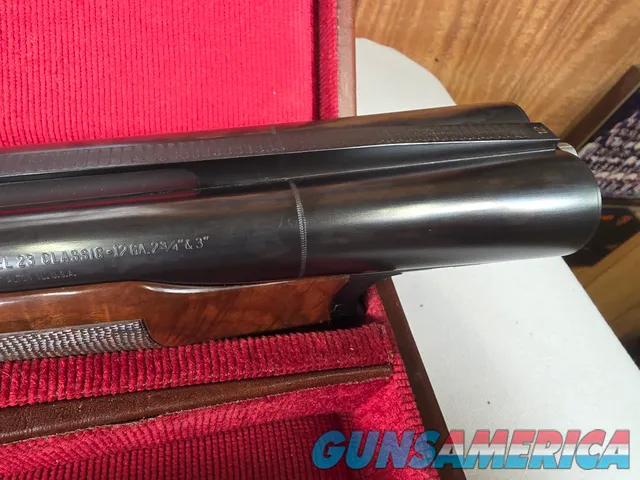 9203 Winchester 23 Classic 12 Gauge, 2 ¾ and 3, 26” barrels, 14 LOP, IC/Mod fixed chokes, butt pad, Really nice dark figured 
