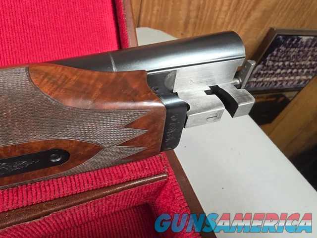 9203 Winchester 23 Classic 12 Gauge, 2 ¾ and 3, 26” barrels, 14 LOP, IC/Mod fixed chokes, butt pad, Really nice dark figured 