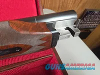 9203 Winchester 23 Classic 12 Gauge, 2 ¾ and 3, 26” barrels, 14 LOP, IC/Mod fixed chokes, butt pad, Really nice dark figured 