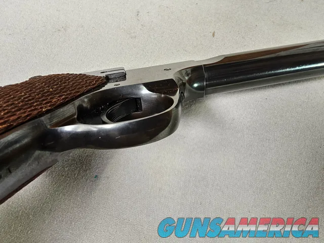 9086  Hi Standard H-D Military, 22 LR, 99%, Excellent collectors condition, 4 ½ barrel, high luster blued, 1946 manufactured,