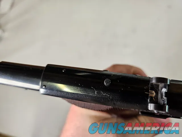 9086  Hi Standard H-D Military, 22 LR, 99%, Excellent collectors condition, 4 ½ barrel, high luster blued, 1946 manufactured,