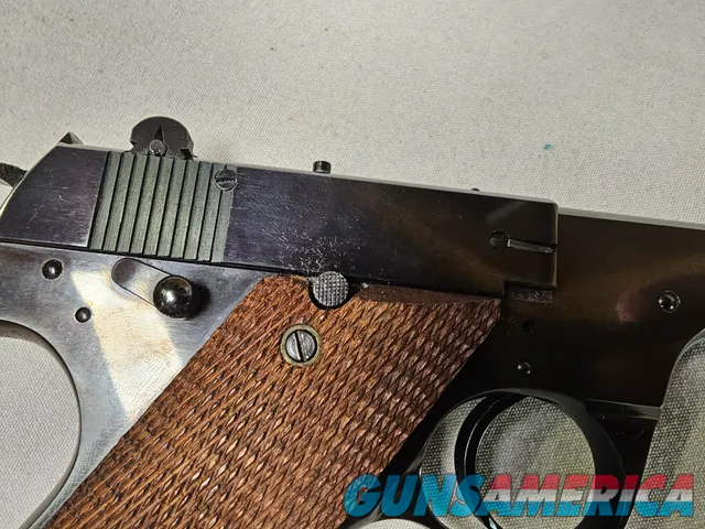 9086  Hi Standard H-D Military, 22 LR, 99%, Excellent collectors condition, 4 ½ barrel, high luster blued, 1946 manufactured,