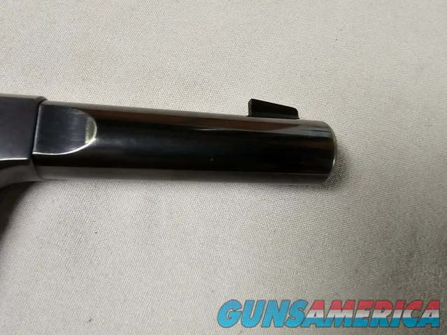 9086  Hi Standard H-D Military, 22 LR, 99%, Excellent collectors condition, 4 ½ barrel, high luster blued, 1946 manufactured,