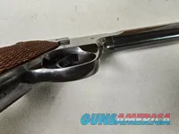 9086  Hi Standard H-D Military, 22 LR, 99%, Excellent collectors condition, 4 ½ barrel, high luster blued, 1946 manufactured,