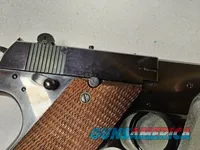 9086  Hi Standard H-D Military, 22 LR, 99%, Excellent collectors condition, 4 ½ barrel, high luster blued, 1946 manufactured,