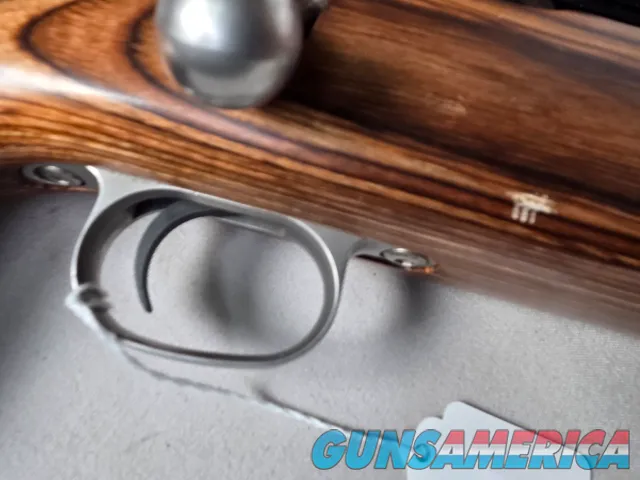 9379  Savage Model 12, 22-250,laminated stock, steel barrel, ebony forend cap, 24: barrel, Whitetail 6.5x20x50 scope,  More p