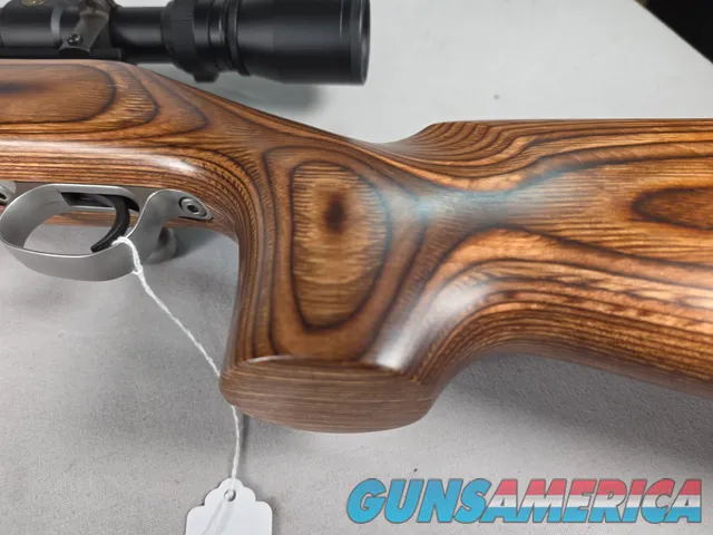 9379  Savage Model 12, 22-250,laminated stock, steel barrel, ebony forend cap, 24: barrel, Whitetail 6.5x20x50 scope,  More p
