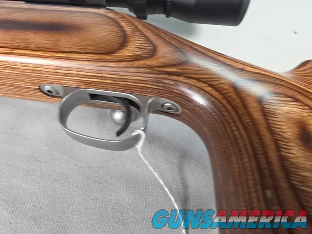9379  Savage Model 12, 22-250,laminated stock, steel barrel, ebony forend cap, 24: barrel, Whitetail 6.5x20x50 scope,  More p