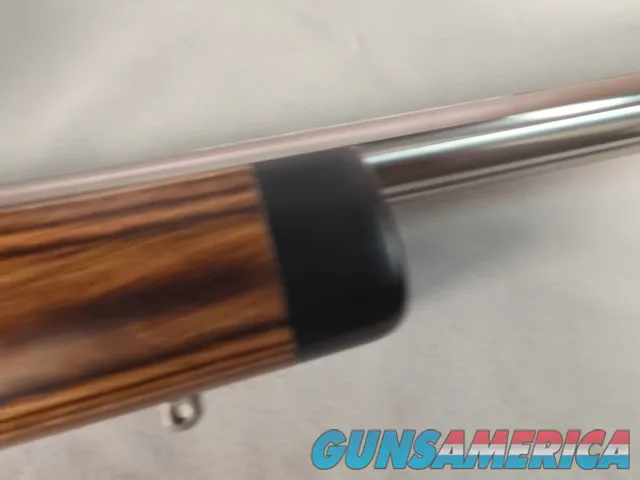 9379  Savage Model 12, 22-250,laminated stock, steel barrel, ebony forend cap, 24: barrel, Whitetail 6.5x20x50 scope,  More p
