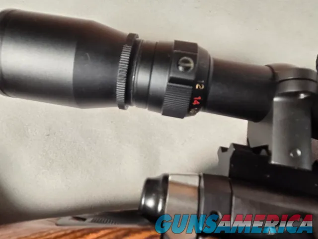 9379  Savage Model 12, 22-250,laminated stock, steel barrel, ebony forend cap, 24: barrel, Whitetail 6.5x20x50 scope,  More p