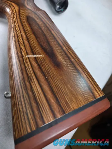 9379  Savage Model 12, 22-250,laminated stock, steel barrel, ebony forend cap, 24: barrel, Whitetail 6.5x20x50 scope,  More p