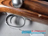 9379  Savage Model 12, 22-250,laminated stock, steel barrel, ebony forend cap, 24: barrel, Whitetail 6.5x20x50 scope,  More p