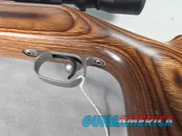 9379  Savage Model 12, 22-250,laminated stock, steel barrel, ebony forend cap, 24: barrel, Whitetail 6.5x20x50 scope,  More p