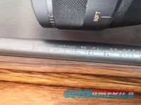 9379  Savage Model 12, 22-250,laminated stock, steel barrel, ebony forend cap, 24: barrel, Whitetail 6.5x20x50 scope,  More p