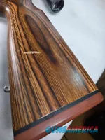 9379  Savage Model 12, 22-250,laminated stock, steel barrel, ebony forend cap, 24: barrel, Whitetail 6.5x20x50 scope,  More p