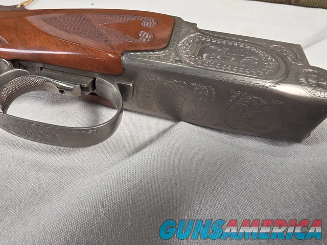 9492—Classic Doubles 101 Grade 2, 410 Gauge, 2 ½ and 3” chambers, 28” Barrels, Mod and Full fixed chokes, Adjustable trigger,