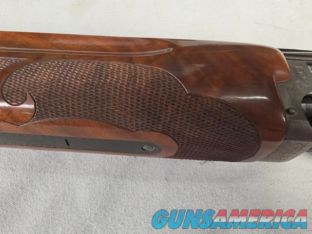 9492—Classic Doubles 101 Grade 2, 410 Gauge, 2 ½ and 3” chambers, 28” Barrels, Mod and Full fixed chokes, Adjustable trigger,