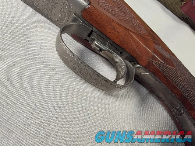 9492—Classic Doubles 101 Grade 2, 410 Gauge, 2 ½ and 3” chambers, 28” Barrels, Mod and Full fixed chokes, Adjustable trigger,