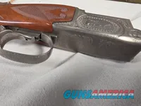 9492—Classic Doubles 101 Grade 2, 410 Gauge, 2 ½ and 3” chambers, 28” Barrels, Mod and Full fixed chokes, Adjustable trigger,