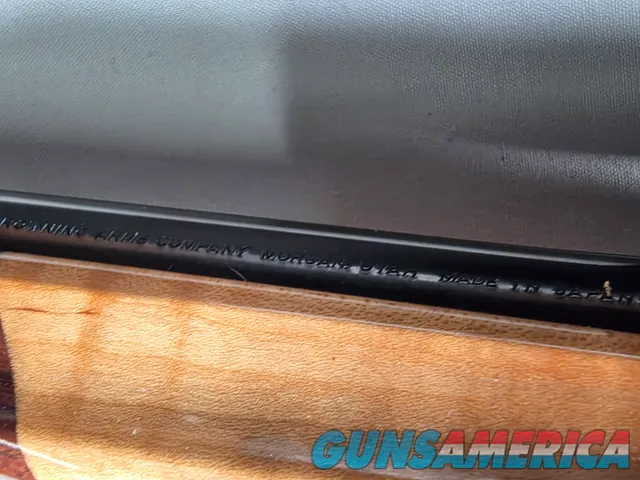 9398 Browning X Bolt, 270 Cal, 22” barrel, Rosewood cap, muzzle brake, Leupold 3.5x10x40 , Tiger striped wood, with box, Mor
