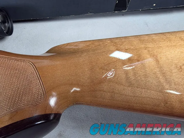 9398 Browning X Bolt, 270 Cal, 22” barrel, Rosewood cap, muzzle brake, Leupold 3.5x10x40 , Tiger striped wood, with box, Mor