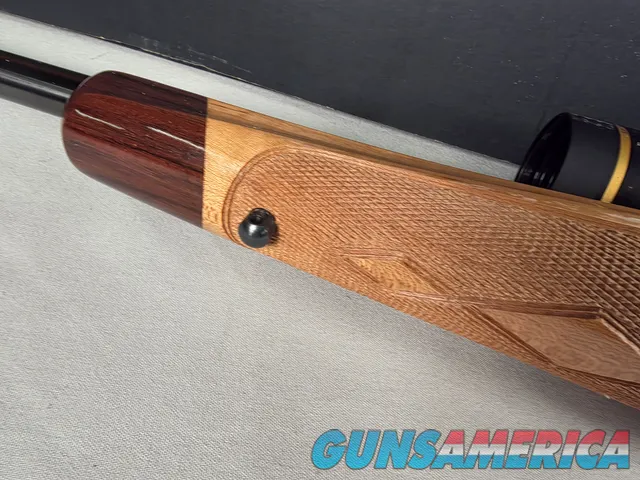 9398 Browning X Bolt, 270 Cal, 22” barrel, Rosewood cap, muzzle brake, Leupold 3.5x10x40 , Tiger striped wood, with box, Mor