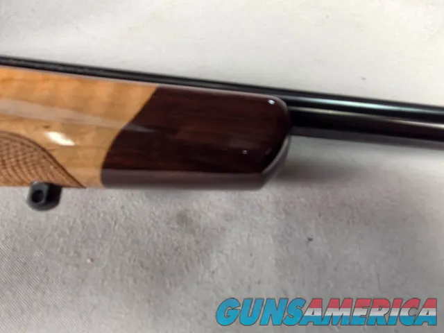 9398 Browning X Bolt, 270 Cal, 22” barrel, Rosewood cap, muzzle brake, Leupold 3.5x10x40 , Tiger striped wood, with box, Mor