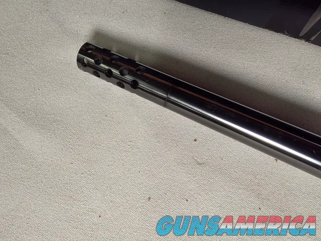 9398 Browning X Bolt, 270 Cal, 22” barrel, Rosewood cap, muzzle brake, Leupold 3.5x10x40 , Tiger striped wood, with box, Mor