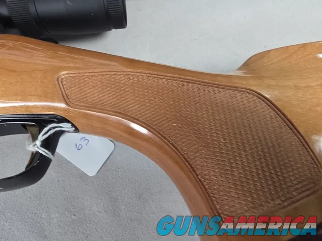 9398 Browning X Bolt, 270 Cal, 22” barrel, Rosewood cap, muzzle brake, Leupold 3.5x10x40 , Tiger striped wood, with box, Mor