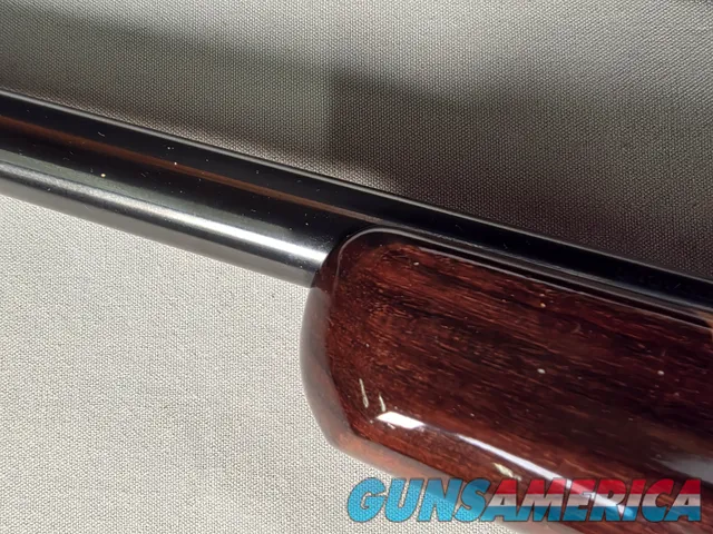 9398 Browning X Bolt, 270 Cal, 22” barrel, Rosewood cap, muzzle brake, Leupold 3.5x10x40 , Tiger striped wood, with box, Mor