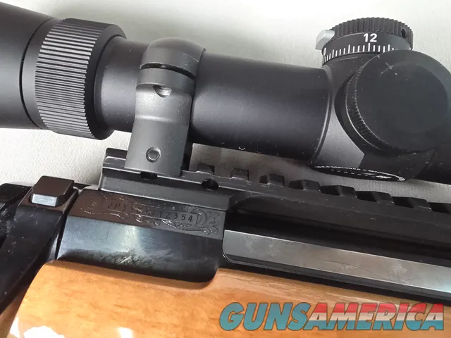 9398 Browning X Bolt, 270 Cal, 22” barrel, Rosewood cap, muzzle brake, Leupold 3.5x10x40 , Tiger striped wood, with box, Mor
